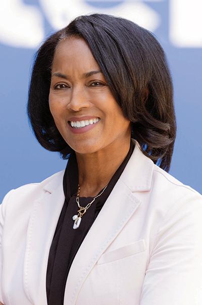 April Miller Boise wearing white suit
