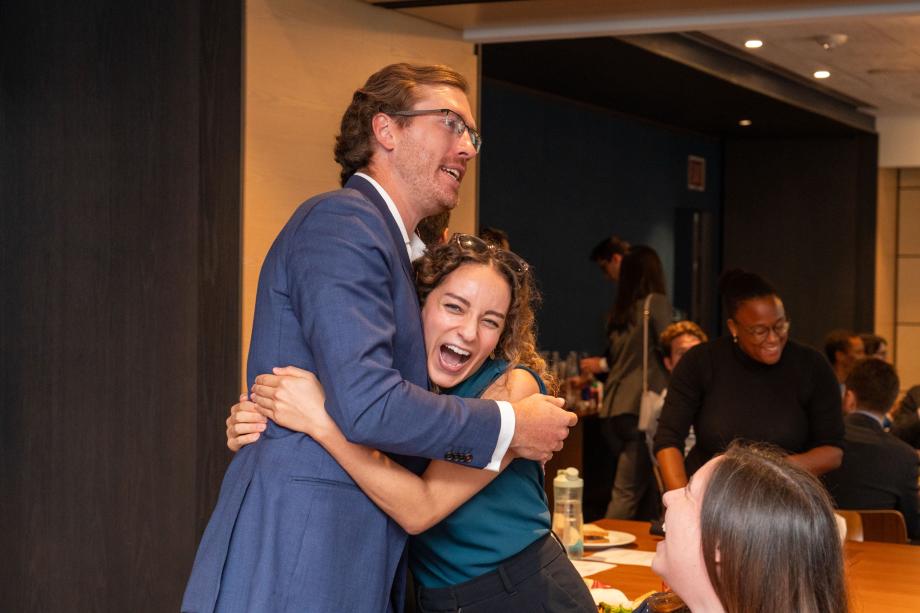 Scholars Alexandra Webb, ’24 and Matthew Makowski Roberts, ’23 were excited to be reunited with their classmates and meet other Scholars. Two people embrace with enormous smiles on their faces.