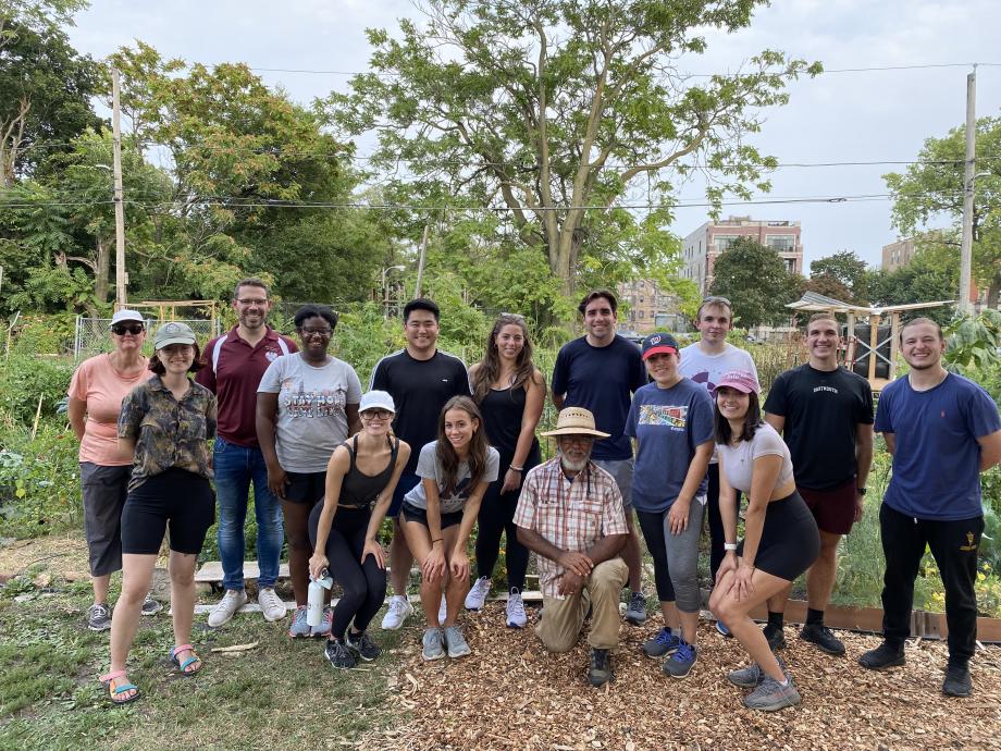 Over the weekend, new students participated in one of nine different community service projects. These included working with the Jackson Park Advisory Council to clean up trash and debris at Jackson Park, working in the garden at Shoesmith Elementary School, and working with My Block, My Hood, My City, to clean up the empty lots at 64th and Vernon. Pictured here is the group of students who spent the service day gardening at the 65th and Woodlawn Community Garden. 