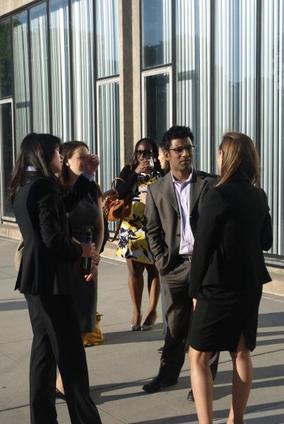 Professor Aziz Huq talks with students. Professor Aziz Huq talks with students.