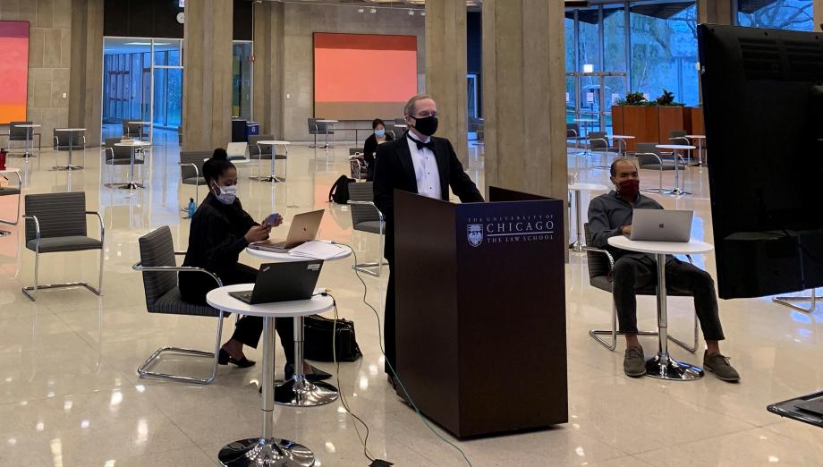 In keeping with tradition, Professor Douglas Baird presided over the live auction—auctioning items in front of a camera in the Green Lounge while participants bid via Zoom.