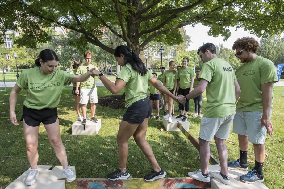Here, students participate in the challenge course portion of Kapnick, which took place on the University’s main quadrangle.