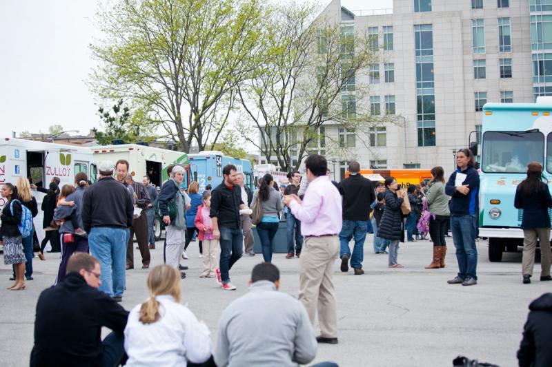 Despite the dreary chill, the trucks drew a crowd of hungry customers. Despite the dreary chill, the trucks drew a crowd of hungry customers.