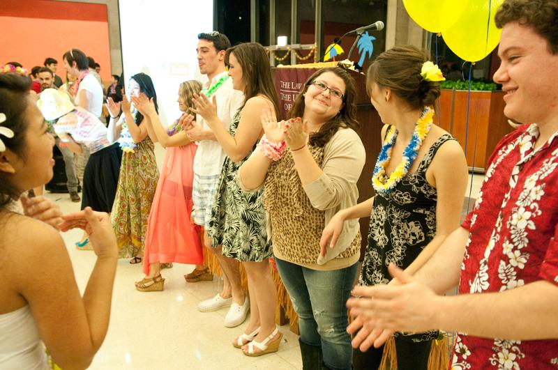 Willing students got hula lessons from a talented group of dancers. 