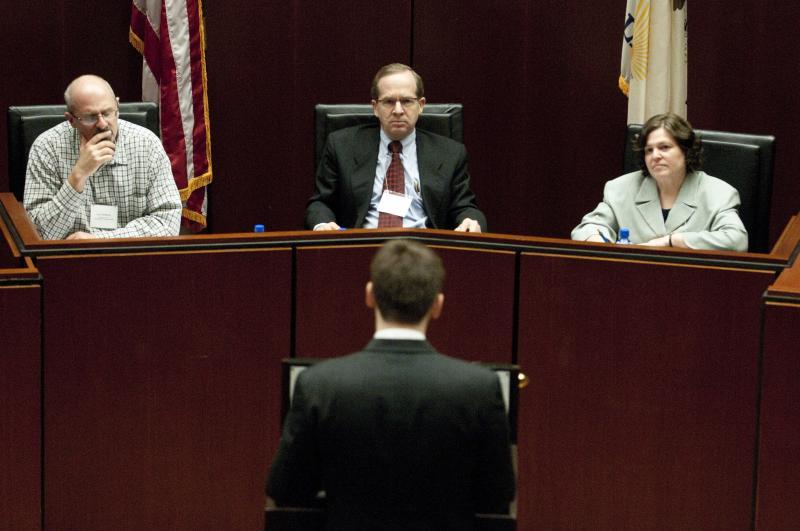 Professors Ginsburg and Baird and Marcia Kramer judging the competition finals