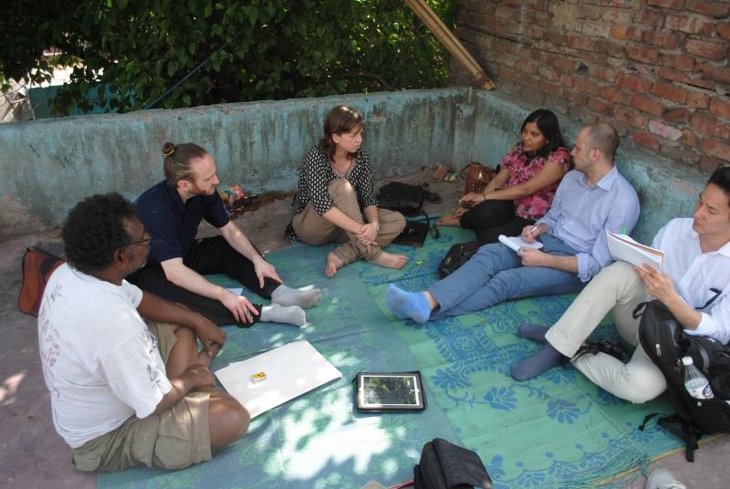 Brian Citro and students Brian Ahn and Segatti with local aid workers. 