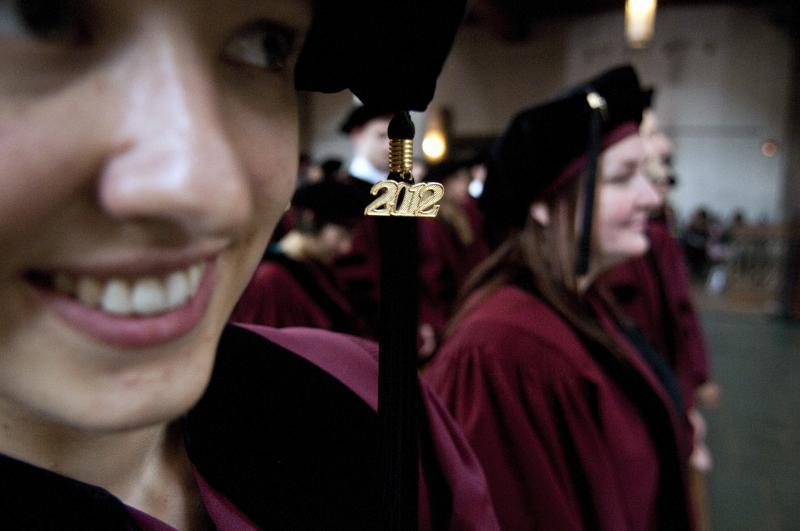 The students waited for their names to be called. 