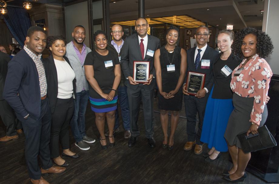 BLSA students gathered to honor Richard R.W. Brooks, '98, Professor of Law at New York University School of Law (third from left), and Sherod Thaxton, '08, Assistant Professor of Law at UCLA School of Law (center), the 2017-2018 recipients of the Earl B. Dickerson Distinguished Leadership in the Law Award. BLSA students gathered to honor Richard R.W. Brooks, '98, Professor of Law at New York University School of Law (third from left), and Sherod Thaxton, '08, Assistant Professor of Law at UCLA School of Law (center), the 2017-2018 recipients of the Earl B. Dickerson Distinguished Leadership in the Law Award.
