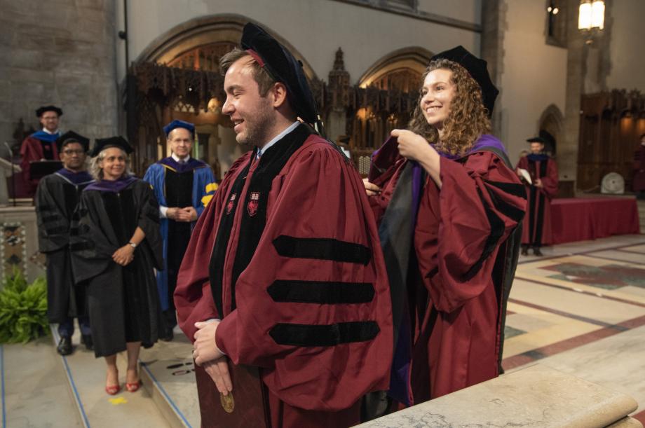 Some students were hooded by family members who had graduated from the Law School. Elizabeth Cooper, ’19, hooded her husband, Christopher Walling, ’19, just a few minutes after receiving her own hood. Some students were hooded by family members who had graduated from the Law School. Elizabeth Cooper, ’19, hooded her husband, Christopher Walling, ’19, just a few minutes after receiving her own hood.