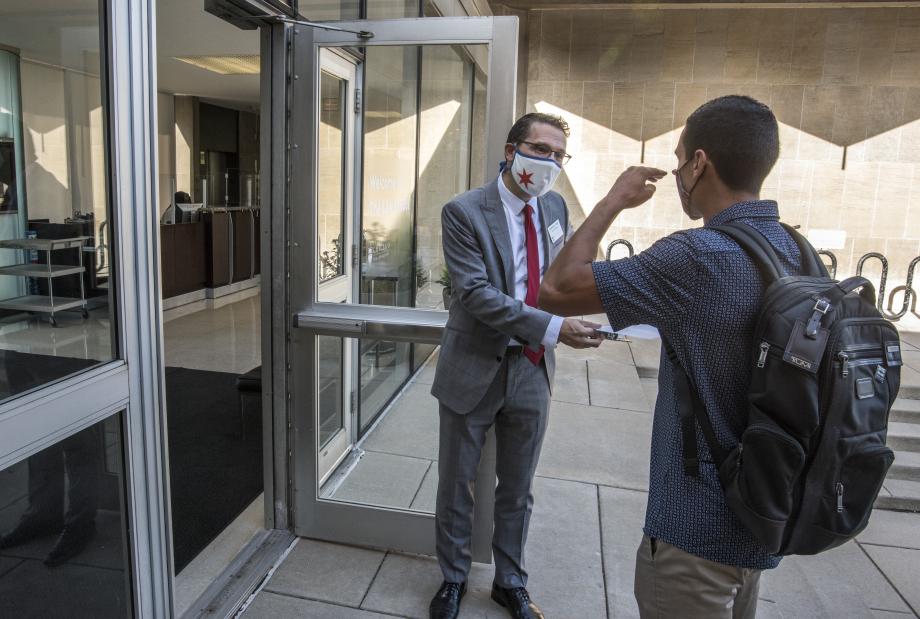 Here, Dean of Students Charles N. Todd greets Pre-Orientation students on their first in-person day of the program.