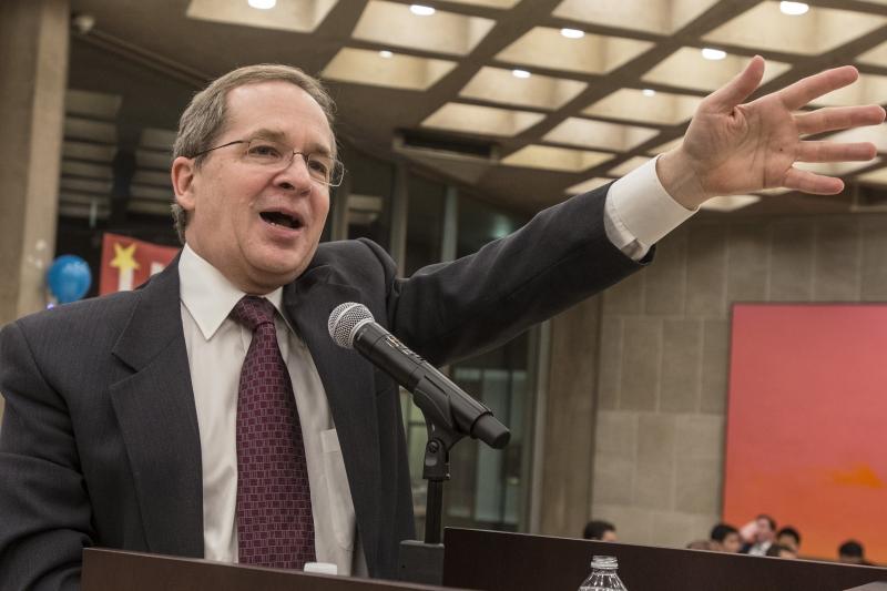 Professor Douglas Baird once again served as auctioneer.