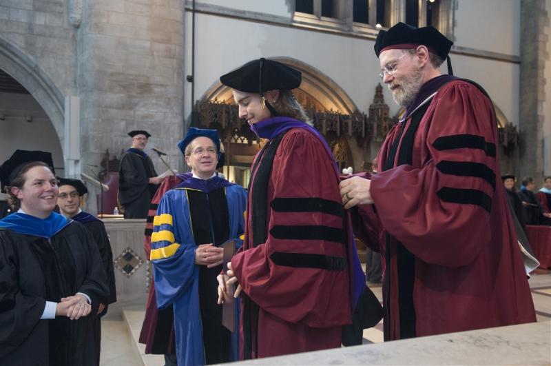 Mara Rose Kennelly Easterbrook, '16, received her hood from her uncle, Seventh Circuit Court of Appeals Judge Frank Easterbrook, '73.