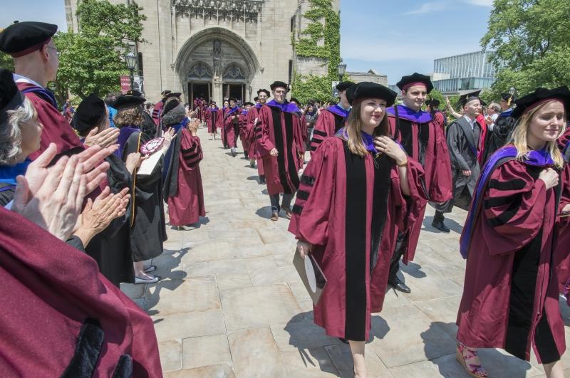 After the ceremony, the graduates recessed from Rockefeller Chapel. After the ceremony, the graduates recessed from Rockefeller Chapel.