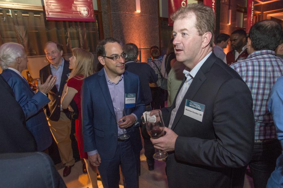 Lior J. Strahilevitz, Sidley Austin Professor of Law, and Matthew Dundon, '98, chatted during the Wine Mess, which was held at The Builders BLDG. Lior J. Strahilevitz, Sidley Austin Professor of Law, and Matthew Dundon, '98, chatted during the Wine Mess, which was held at The Builders BLDG.