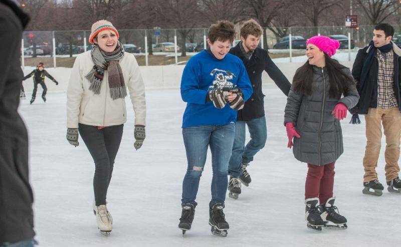 Amy Barber, ’17, in blue, grew up playing ice hockey on an all-boys team.