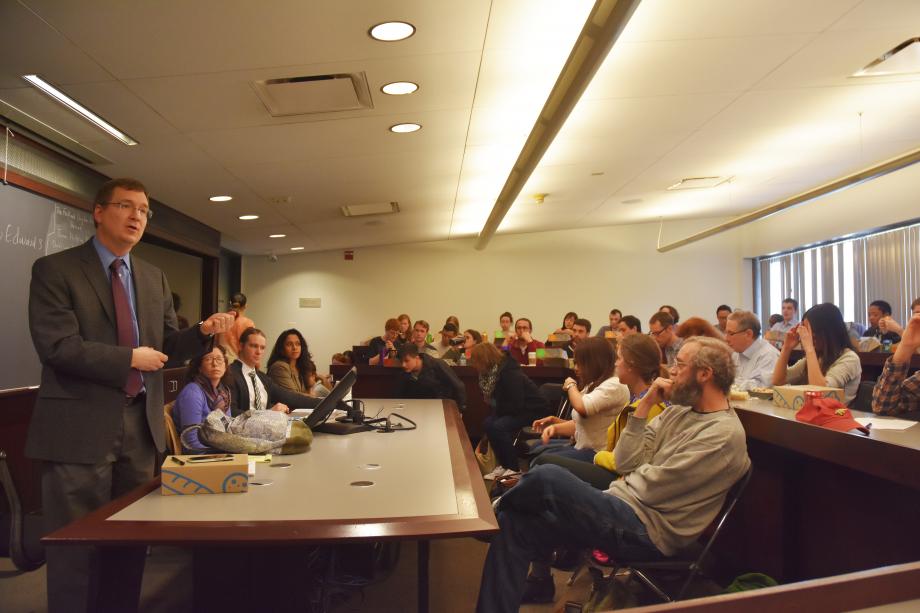 Professor Mark Templeton speaks from the front of a classroom