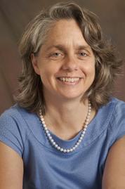 Professor Emily Buss sits for a headshot