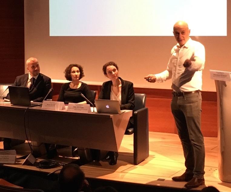 Omri Ben-Shahar speaking on a panel in Paris