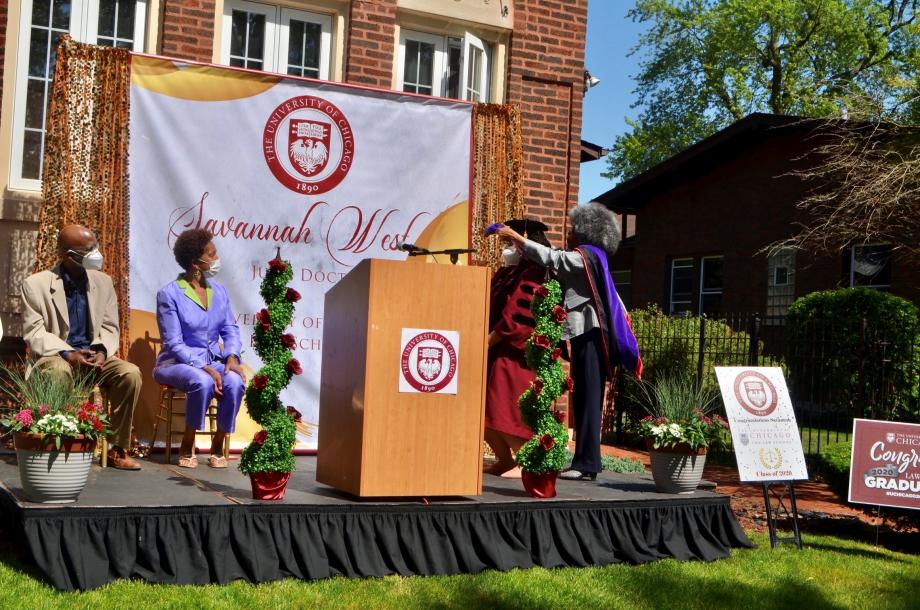 Nwosu being hooded by Conyers