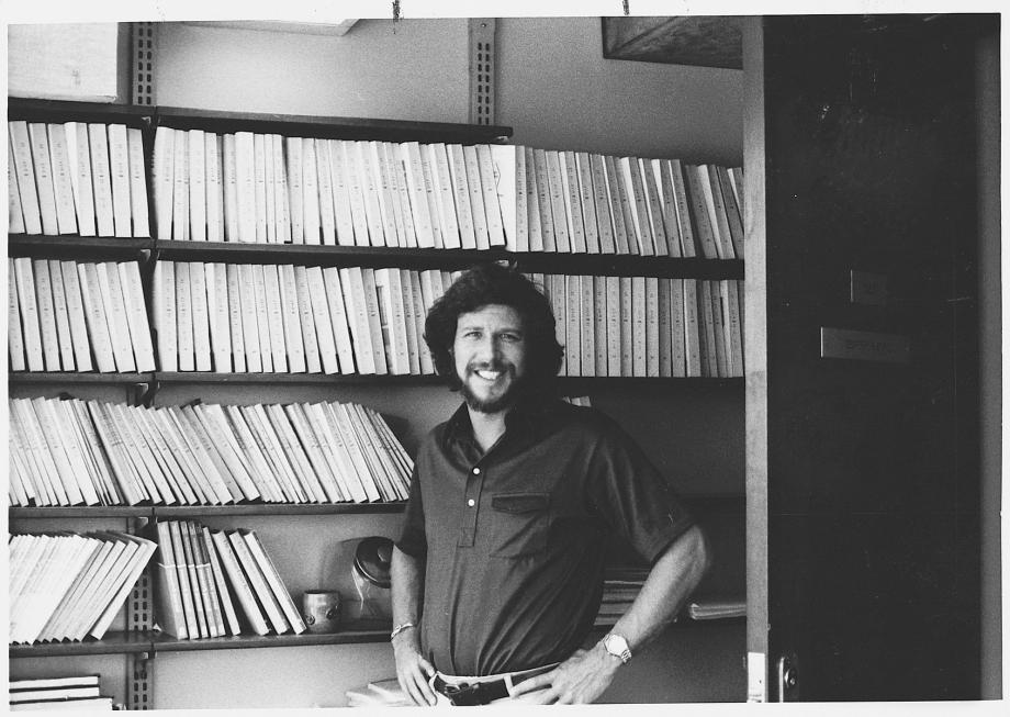 During his time as provost, Stone coedited eight volumes of the Supreme Court Review, the leading journal of constitutional law read by academics, judges, and practitioners the world over since 1991. Stone, in a polo, smiles in his office in front of rows of issues of the Supreme Court Review.