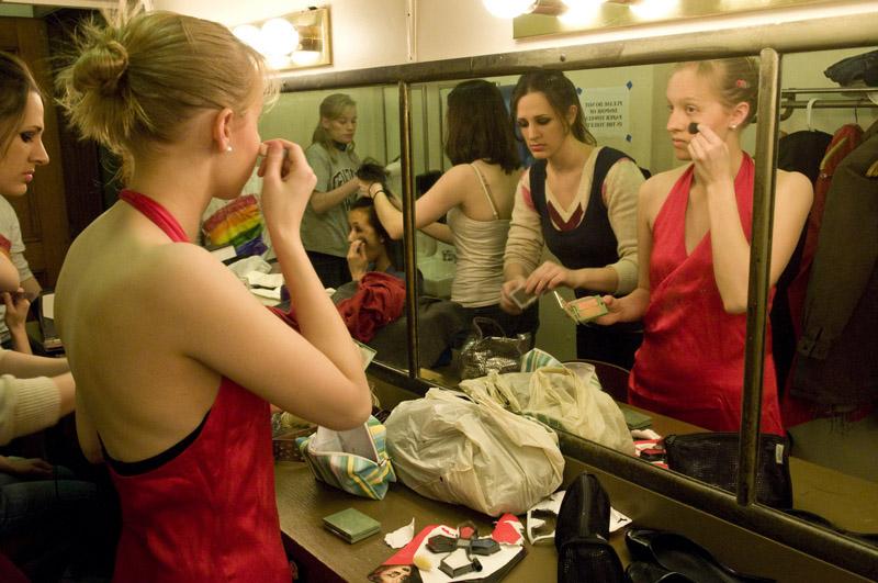 Sigrid Jernudd, '12, as Professor Martha Nussbaum, applies her stage makeup.