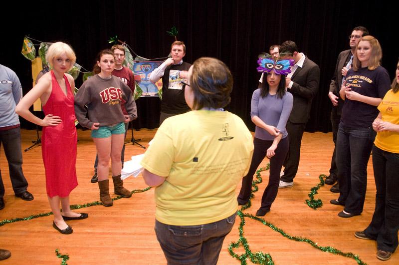 Director Becky Moseley, '11, instructs the cast during rehearsal.