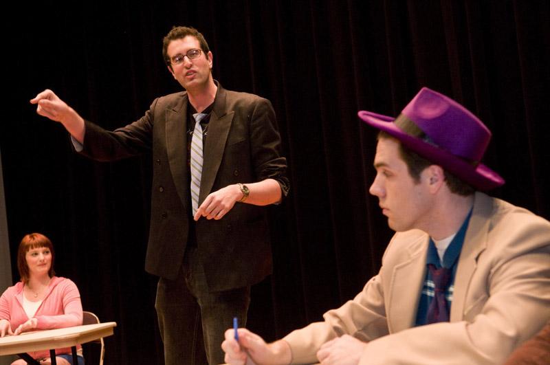 Evan Berkow, '11, as Professor Adam Cox.