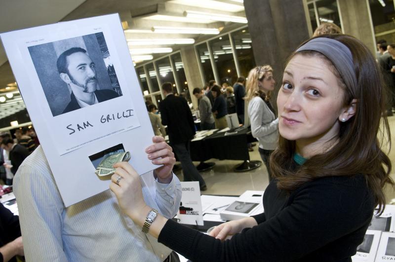 Sam Grilli, '11, gets a vote of confidence in the mustache contest from his wife, Taya.