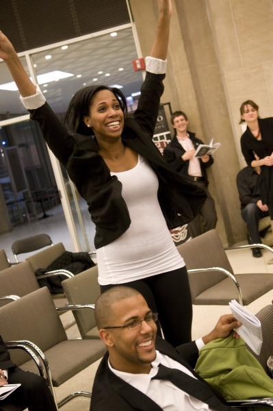 Ashley Satterfield, '10, joyfully celebrated her winning bid. 