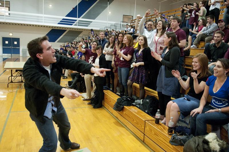 Chicago Law students cheer their classmates from the bleachers.