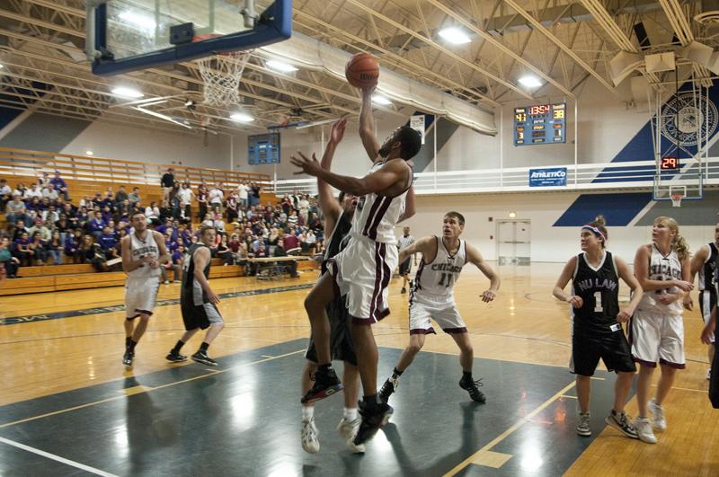 Jason Owens, '11, facing a Northwestern opponent.