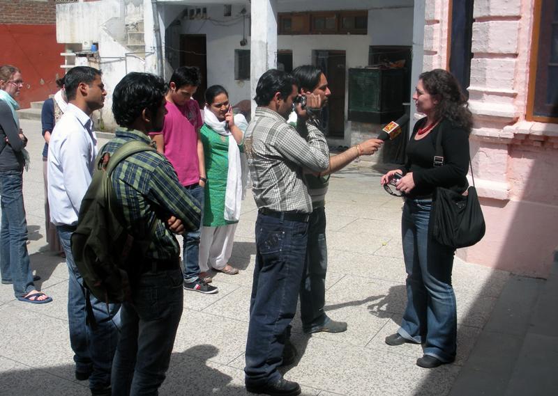 Television reporters in Jammu, India, interview 3L Maya Ibars