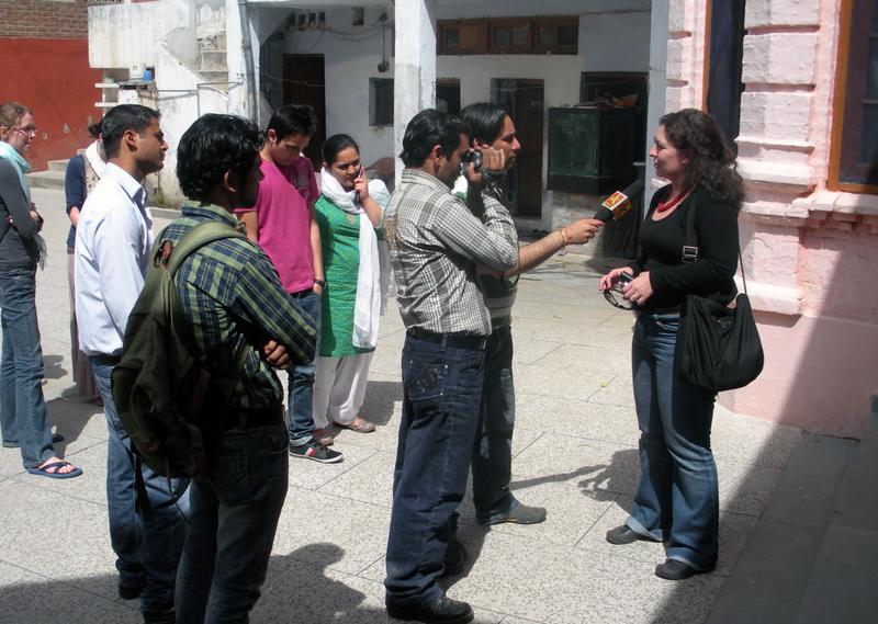 Television reporters in Jammu, India, interview 3L Maya Ibars about the International Human Rights Law Society's work with Kashmiri Pandits in Jammu. Television reporters in Jammu, India, interview 3L Maya Ibars