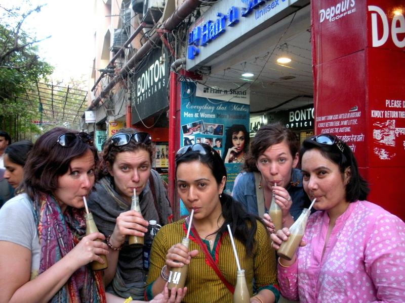 3L Kelly Albinak, 2L Audrey Gilliam and SSA student Deanna Lesht enjoy one of India's famous "cold coffees" outside of Janpath Market in New Delhi, India. 3L Kelly Albinak, 2L Audrey Gilliam and SSA Deanna Lesht with cold coffee