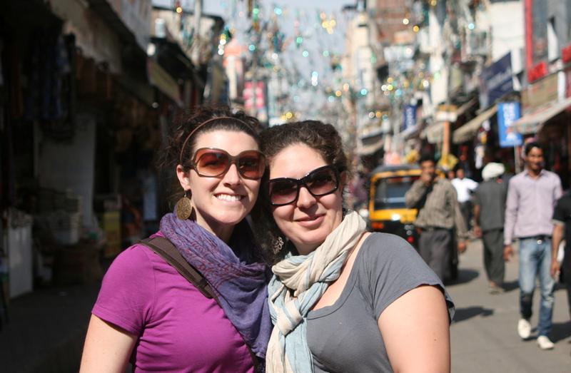3L Maya Ibars and SSA student Megan McDermott pose in the streets of Jammu.