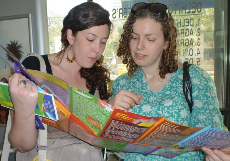 2L Audrey Gilliam and SSA student Deanna Lesht examine a map of New Delhi.