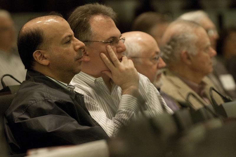 Alumni listening to the talk in the Law School's Auditorium. Alumni listening to the talk in the Law School's Auditorium.