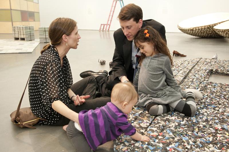Alumni and their children enjoy an exhibit at the Museum of Contemporary Art.