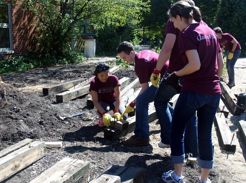 Students split into groups for service projects around the city. Students split into groups for service projects around the city.