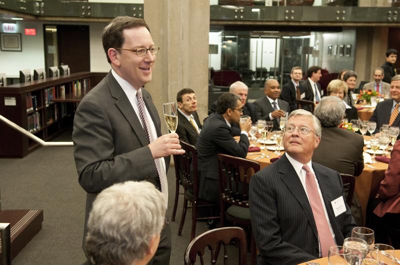 Dean Michael Schill presenting a toast at dinner.