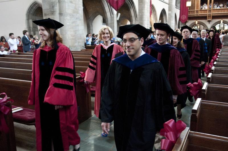 The faculty process into Rockefeller Chapel. The faculty process into Rockefeller Chapel.