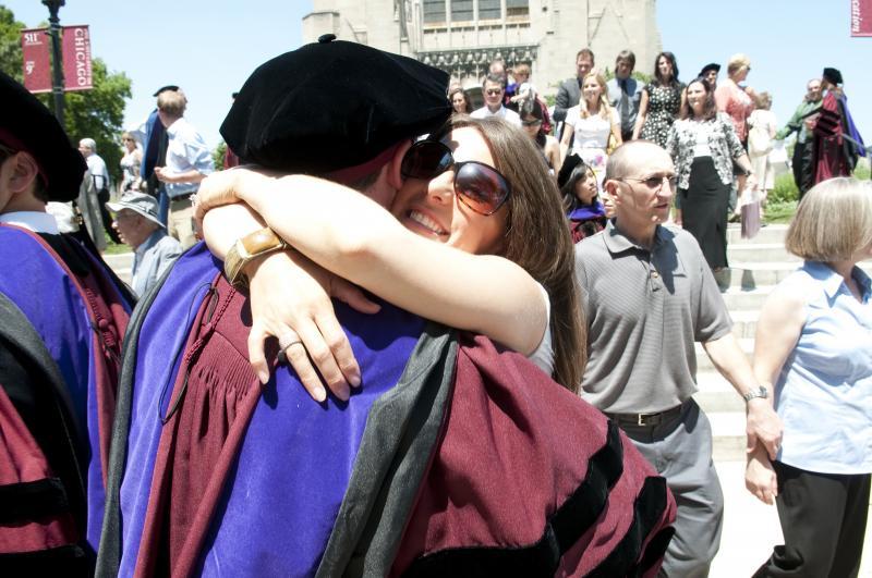 Family and friends expressed great pride in the new graduates. Family and friends expressed great pride in the new graduates.