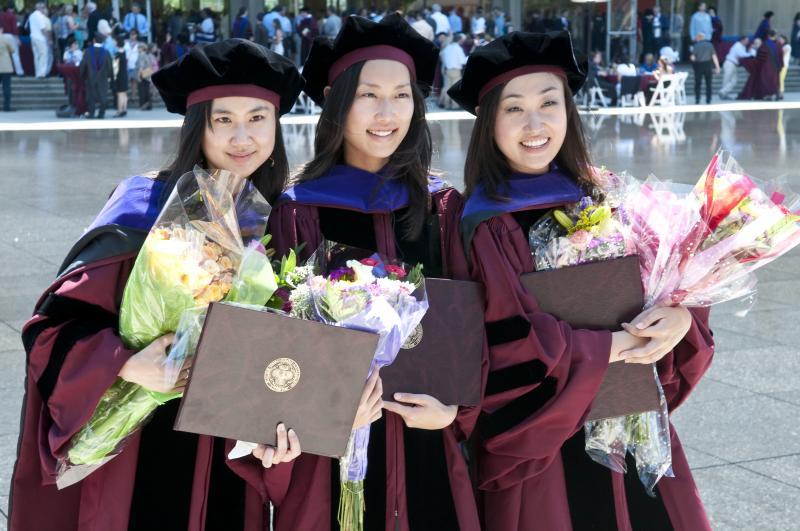 Some families came armed with flowers for new graduates.