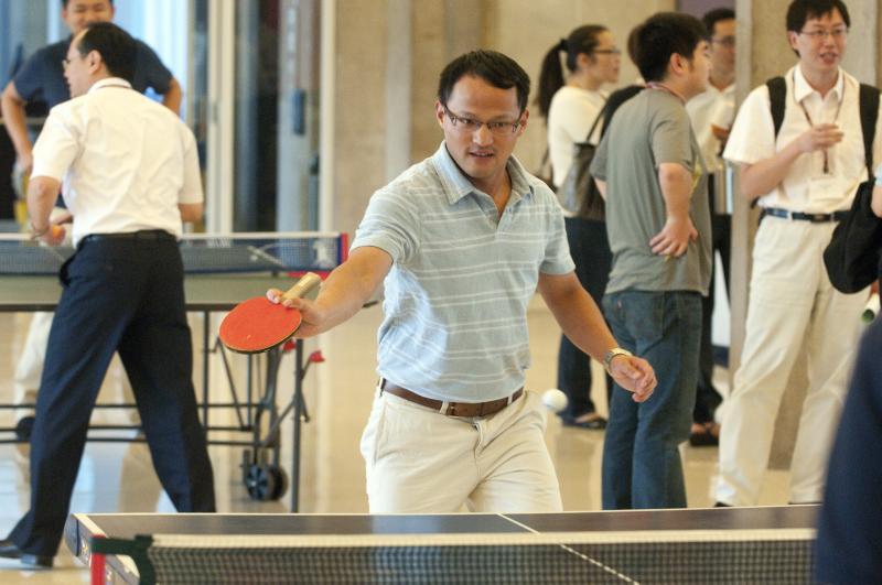 A ping-pong player unwinds after the first day of classes. 