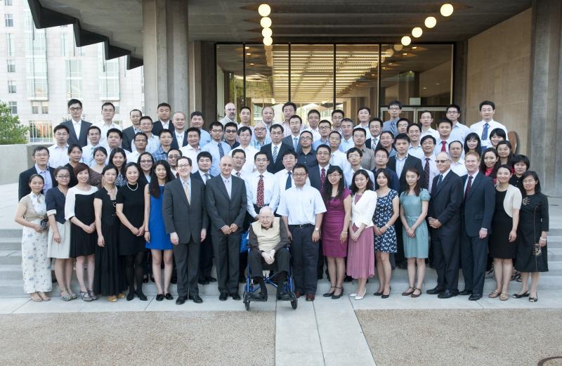 The students with Professors Coase and Ben-Shahar and Dean Michael Schill.