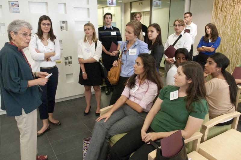 White, left, often talks with Law School students about public interest careers. White, left, often talks with Law School students about public interest careers.