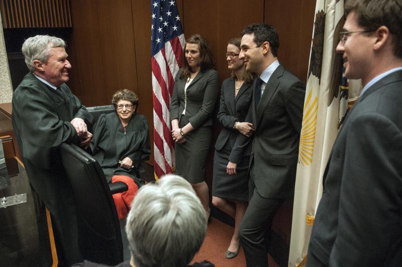 Judge James B. Loken chats with the finalists and fellow judges. 