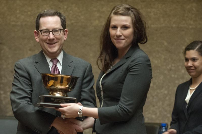 Schill and Meehan with the Llewellyn Cup, presented to the runners-up.