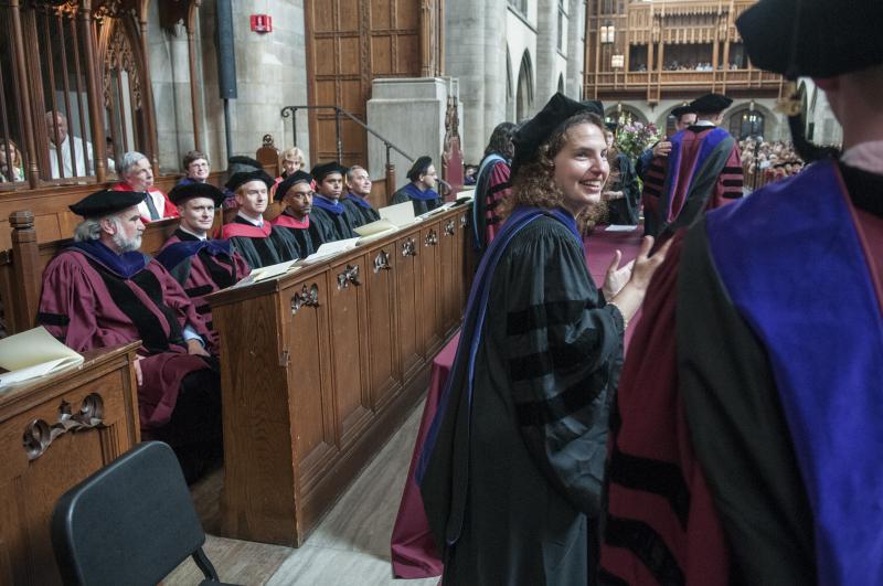 Sheri Lewis and other faculty members looked on. 