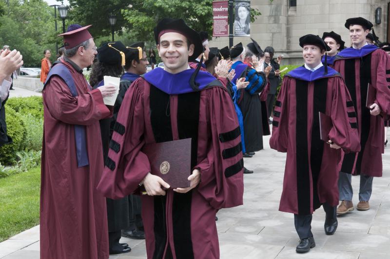Students left Rockefeller with their diplomas, their hoods, and big smiles. Students left Rockefeller with their diplomas, their hoods, and big smiles.